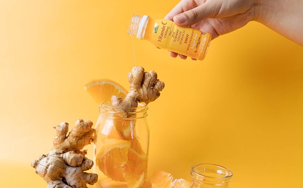 vitamin c shot pouring in cup