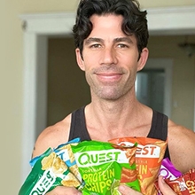 Man holding bundle of chips